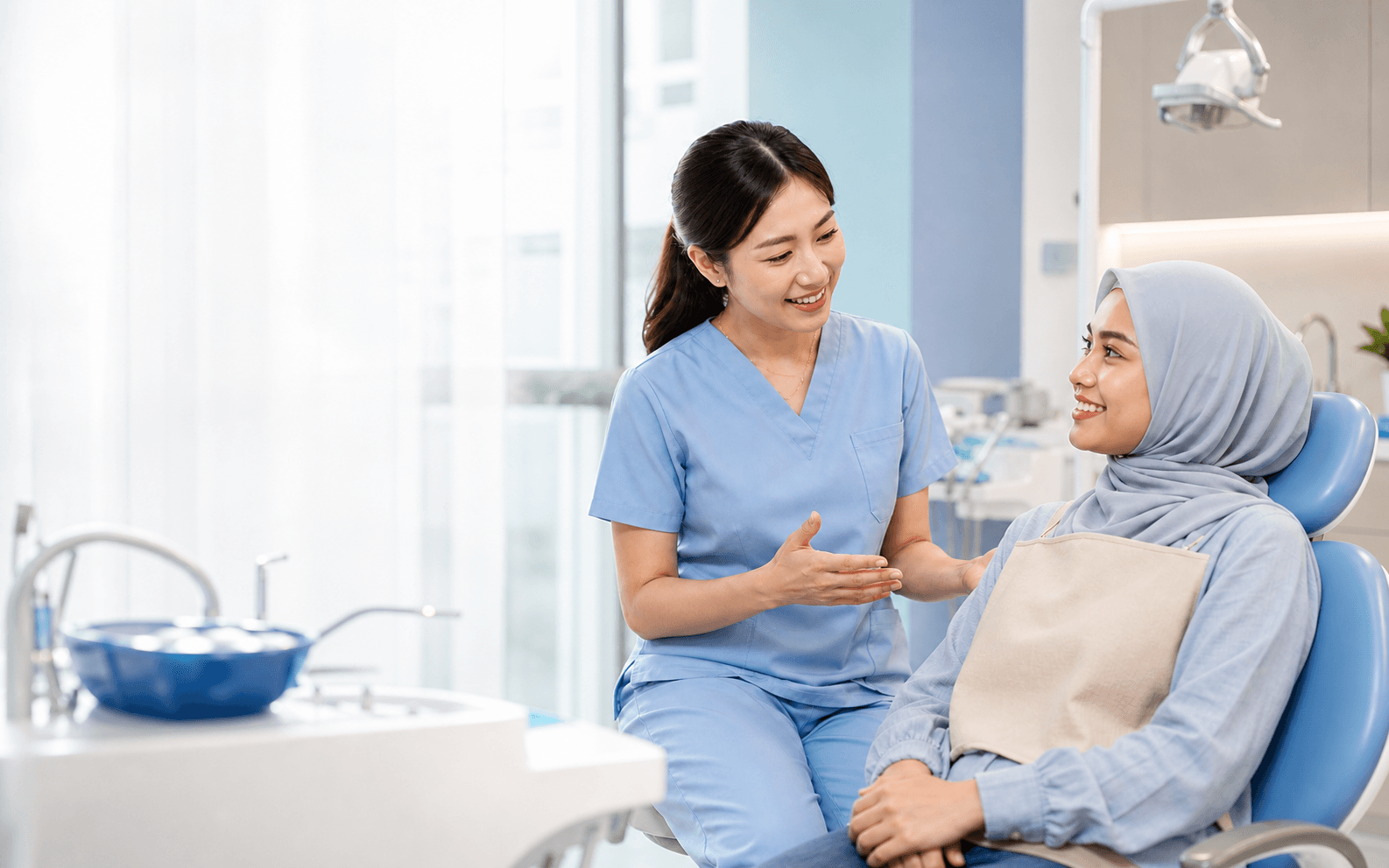 Dentist speaking with a patient in a modern clinic